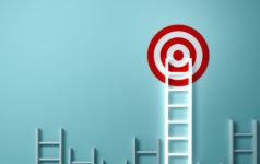 ladders reaching up to a target