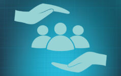 hands above and below people, protectively