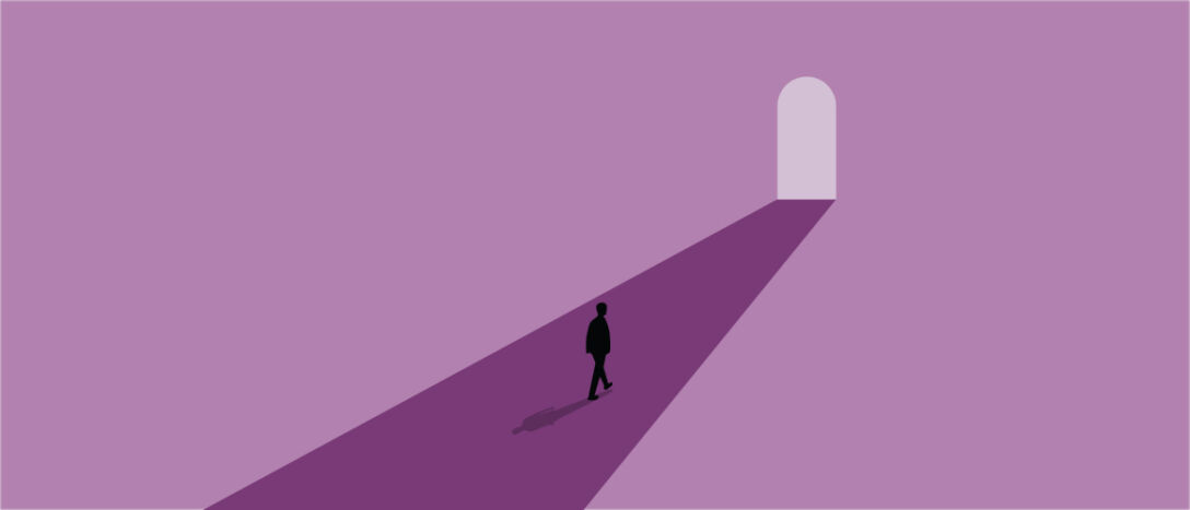 T9_0000_man walking through archway